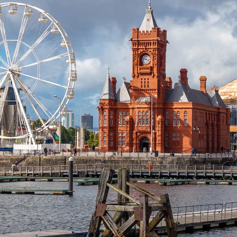 Cardiff Bay skyline with Pierhead Building, Wales Millennium Centre, and city attractions.
